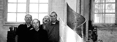 From left to right, Juan Orejas, Pere Casanovas, Elías G. Benavides and Joan Pedragosa in Casanovas's workshop.